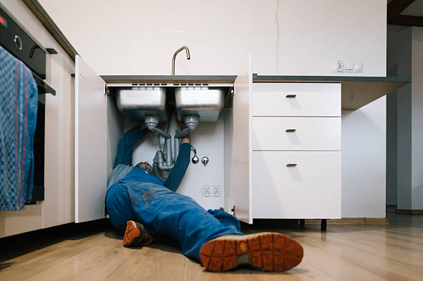 Professional Emergency Plumber technician working in Dickens, IA